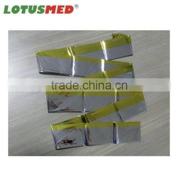 Disposable thermal emergency blanket