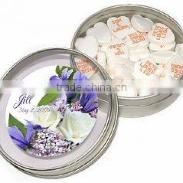 small round candy tin