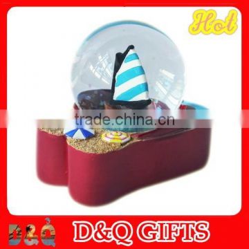 Souvenir polyresin sailing boat snow ball