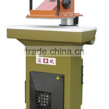 hydraulic swing beam die cutting machine