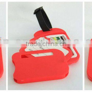 Plastic luggage tag with sewing kit