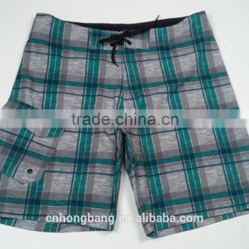 newest design clothing board shorts in stock for men surfing on the beach