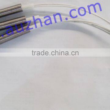 Mould high density cartridge heater with spring terminal