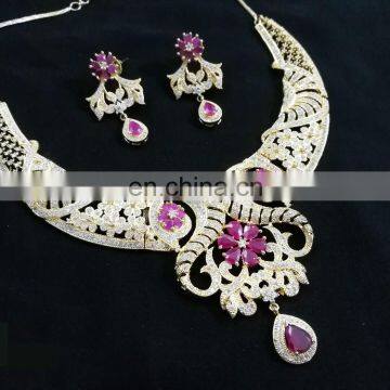 Stylish Floral Look Pink Color Gold Plated American Diamond Jewelry Necklace Earrings Set