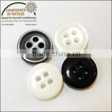 white and black 4 hole plastic button