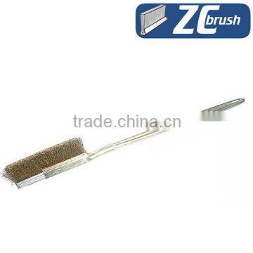 Steel wire brush manufacture