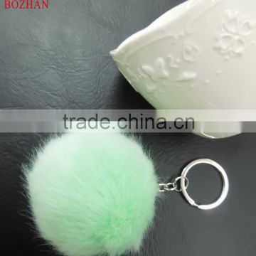 Hot selling raccoon pom pom key chain for gift