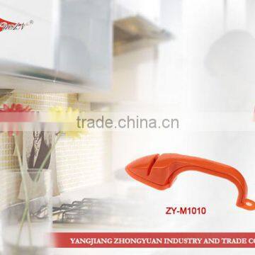 Precision edge knife or scissors sharpener with full length safety handle