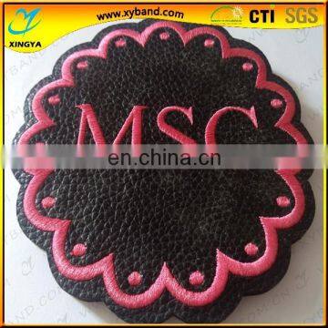 round leather 3D effect badges