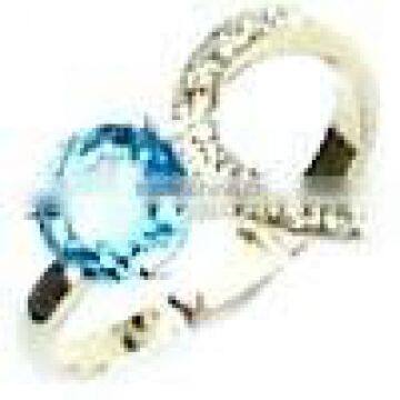 Ring With Blue Topaz & Diamonds