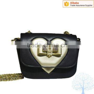 Heart shape pu cross body handbag with metal bowknot jewelry