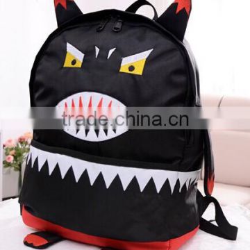 black cartoon monster backpack