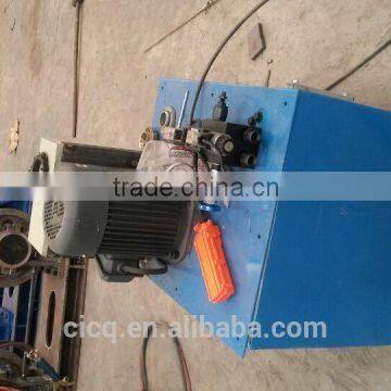 Button head making machine for pre-tensioned piles