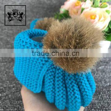 Hand Knitted Fur Pom Poms Fashion Wholesale Moccasins Cheap Soft Baby Shoes Booties