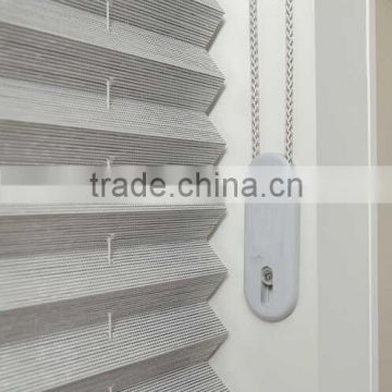 Gray white pleated blinds