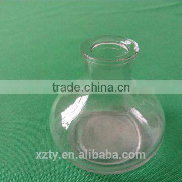 little glass round bottle for candlesticks