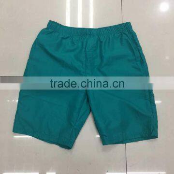 China stocklots men 100%polyester pure color bermuda shorts