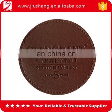 Factory supply leather pu coaster with debossed logo