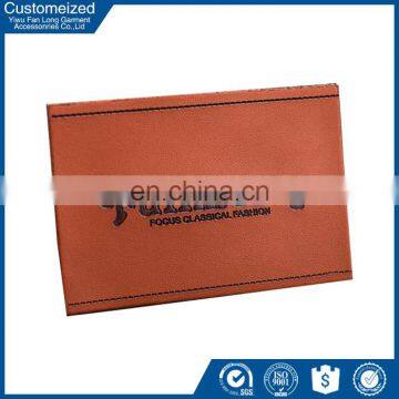 Factory Direct Sale First-class Embossed Jeans pu Leather Labels Design photo-4