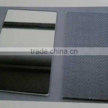 Woven safety film for mirror backing security protection