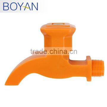 plastic orange water faucet