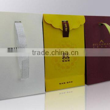 paper bag with ribbon handle