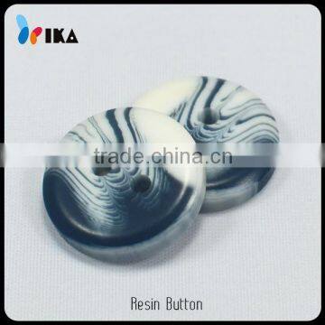 fancy raised grain resin buttons with random artwork for sweater