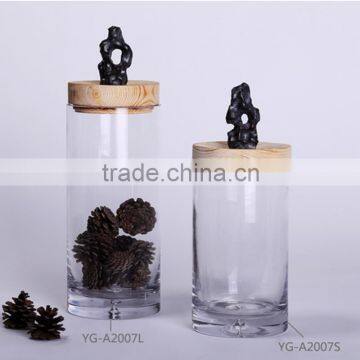 Glass storage jar with wooden lid for home decoration