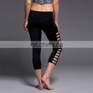 Yihao Sales Low MOQ Legging Sport Women Yoga Capris Spandex /Polyester Side Hollow Custom Yoga Leggings photo-3