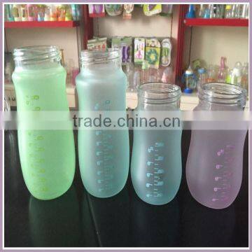 2015 new color change baby bottle,flat bottom glass baby bottle,bpa free silicone coating glass baby bottle