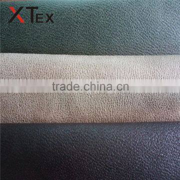 hot sale 100% polyester bronzed embossed faux suede leather look like fabrics for sofas,cushions,chairs