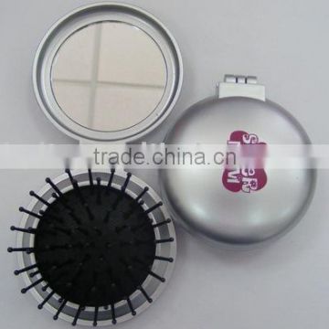 pocket mirror with hair brush