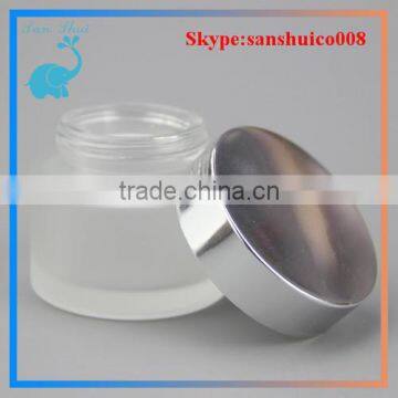 cosmetic glass jar with silver caps