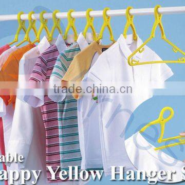 japanese plastic household tool washing detergent ceramic ball clothes door foldable happy yellow hangers 10 pcs set