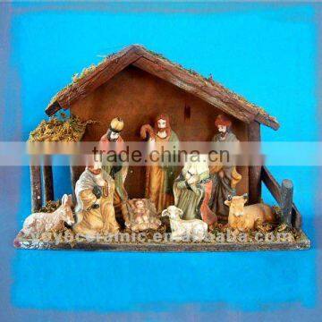 nativity set with wooden stable