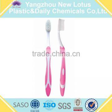 Adult toothbrush with nylon soft bristles and rubber