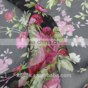 Printed 100% Silk Crepe Georgette with black background and flowers