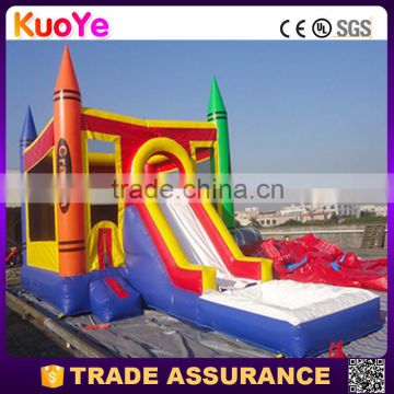 colourful crayon type inflatable bouncy castle with water slide