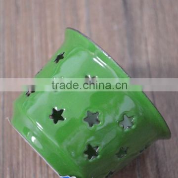 Green star enamel candle holder