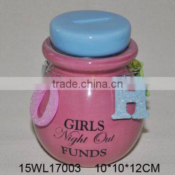 Ceramic coin bank with hanging ornament in bright color