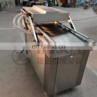 Automatic Continuous Rice Vacuum Packaging Machine photo-5