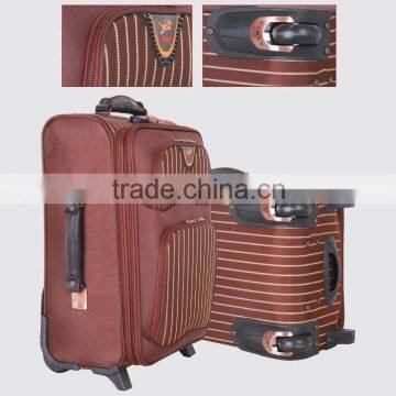 brown luggage bag