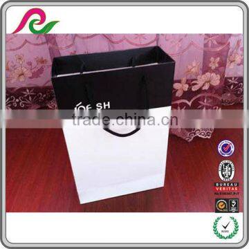 Customize glossy paper boutique shopping bags with logo printed