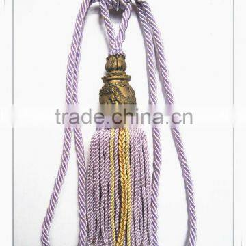 Plaster curtain tiebacks with dragon design, bullion fringe, tassel