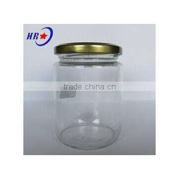 clear glass jar with golden lid