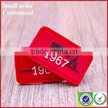 Private Indonesia Red Shield Shape Pvc Label for Suitcase Flannel Shirt photo-4