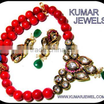 kundan set with ruby mala.