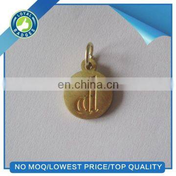 custom die struck brass metal charms