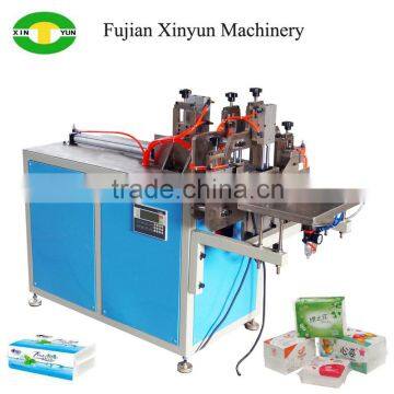 Facial tissue paper plastic bag packaging machine