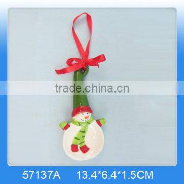 Decorative ceramic christmas spoon rest with snowman painting and rope for hanging